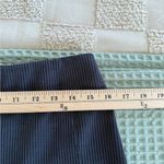 Lululemon  Ribbed Softstreme Zip-Leg High-Rise Cropped Pants 25"
Black
Size 10 Photo 4