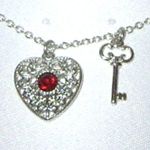 Avon Northwest Territories Silver Heart & Key Necklace Photo 0