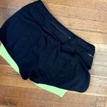 Nike  dri fit black neon green running shorts athleisure workout pants pocket Photo 3