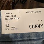 American Eagle jeans. These are light in color boot cut and size 14 Photo 1