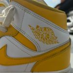 Nike Jordan Women’s Mid 1 Yellow and White Photo 5