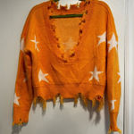 Zaful  Star Print Cropped Chewed Hem Sweater Orange and White LongSleeve One Size Photo 0