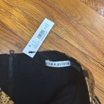 Alice + Olivia Gold metallic print on black leather skirt  Photo 2