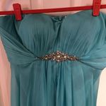 La Femme  Floor Length Broach Gown Photo 1