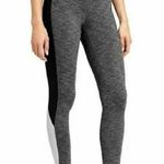 Athleta  Colorblock Revelation Tight in size small Photo 0