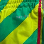 Nike  Dri-Fit Athletic Shorts Women's size Small in Green Yellow stripes running Photo 6