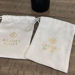 Kendra Scott Cream Pouches with Gold Logo Photo 0