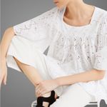 Like New Merlette Brandt Eyelet Tiered
Swing Blouse White Medium Retail $500.00 Photo 2