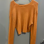 Francesca's Orange sweater Photo 1