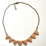 Peach enamel and gold tone triangle necklace Photo 1