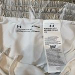 Under Armour Women's Metallic Silver and White Athletic Shorts Photo 1