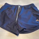 Tracksmith Women’s navy Van Cortlandt “Grande” running short. Blue Photo 0