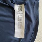 ASICS  Women’s Medium Navy Blue Racerback Athletic Tank Top Photo 3