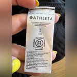 Athleta  Triumph Hybrid Half Zip Sweatshirt black size small Photo 4