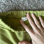 Le lis  Women's Flare Pants in Olive Green Photo 1