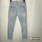 Forever 21 Light wash blue skinny jeans with distressed details Stretch Photo 3