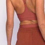 Skatie Zero Racerback Sports Bra in "Dune" Terra Cotta Color Photo 1
