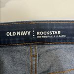 Old Navy  midrise Rockstar dark denim jeans Photo 3