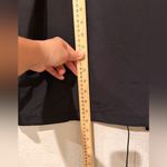 Nike Sportswear Essential
Women's Oversized UV Woven Coaches size Large black Photo 6