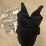 One Piece Black Swimsuit Photo 2