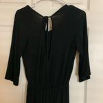 The Comfy Black long sleeve open back romper Photo 5