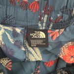 The North Face Women’s blue floral print 4” shorts Size Medium Photo 2