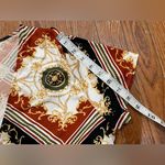 Eye Candy  Geometric Wrap Blouse in Black, Brown, and Gold Photo 8