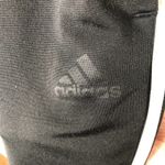 Adidas black white striped athletic pants Photo 1