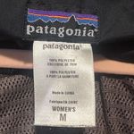 Patagonia  women’s rain jacket size M black hooded Photo 7