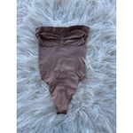 SKIMS  Seamless Sculpt Strapless Thong Bodysuit Sienna  
Size Medium Photo 1