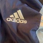 Adidas  wind breaker running jacket. Size Medium. Drawstring. Snap closure. Photo 6