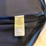 Athleta  Womens Size Medium Stratus  Long Sleeve Blue Solid Relaxed thumbhole Photo 7