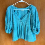 Urban Outfitters  Smocked Peplum Top Blue V Neck 3/4 Sleeve Babydoll Size S Photo 0