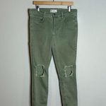 Free People Army Green distressed skinny jeans Photo 0