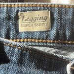 AG Adriano Goldschmied Blue Skinny Jeans with Faded Appearance and Five-Pocket Styling Photo 4