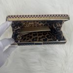 Madison West  | Hard Case Clutch Photo 11