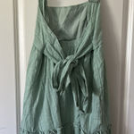 Love Riche Boutique green dress with bow in the back Photo 0
