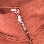 Fabletics  rust apricot color Half-Zip athletic Pullover size XLarge Photo 3