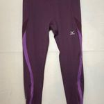 Mizuno  purple Womens running leggings with reflective zippers Photo 0