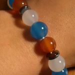 Red, White, and Blue Agate And Hematite Stainless Steel Bracelet Photo 0