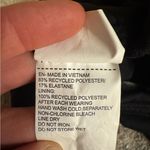 Nike Women's Black Sports Bra with White Swoosh Photo 5