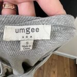 Umgee  Heather Gray Ribbed Bell Sleeve Lace Back Ruffle Hem Long Sleeve Top Photo 6