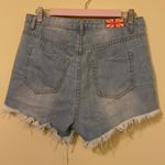 Machine ripped high rise Jean shorts Size 30 Photo 1