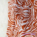 NEW Rhythm Hallie deep V pants animal print, size S Red Photo 9