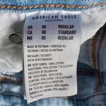 American Eagle  Highest Rise 90’s Boyfriend Light Wash Distressed Jeans Size 00 Photo 10