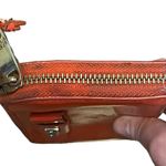 Badgley Mischka zip around red wallet with several compartments Photo 5