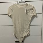 Abercrombie & Fitch Soft Matte Seamless Tee Bodysuit Cream NWT Photo 1