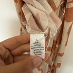 Dress Forum Boutique print orange and Cream Jumpsuit Photo 9