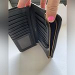 Coach  Black leather skinny wallet Photo 3