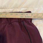 Lululemon On the Right Track Relaxed fit Pant Burgandy/ Wine size 10. Photo 11